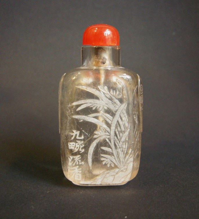 Rock crystal snuff bottle sculpted in the white with flowers reeds | MasterArt